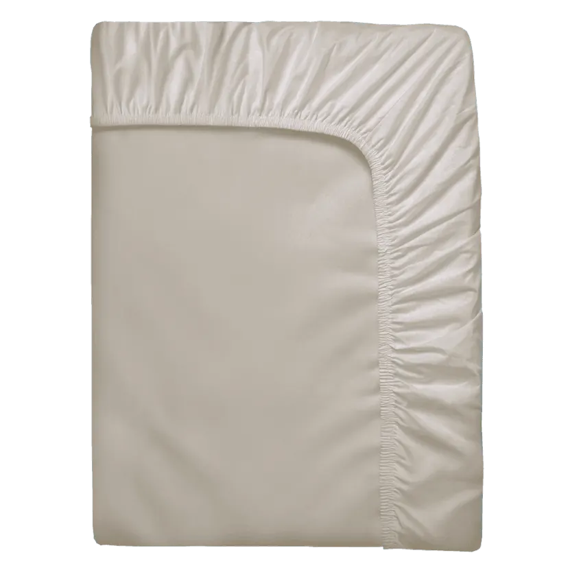 Opgevouwen beige hoeslaken met elastische rand rondom